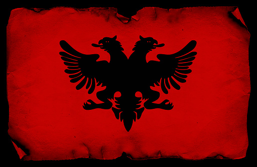 Albanian flag in grunge and vintage style.