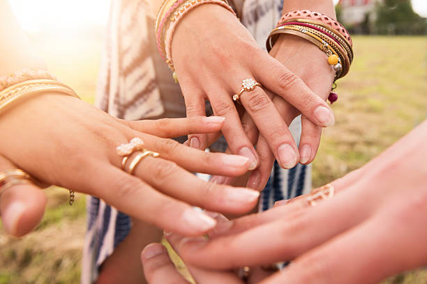 istock Hands decorated with colorful jewelery 538877444