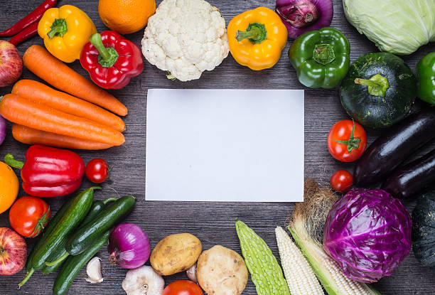 istock different fruits and vegetables on old wooden table 538877506