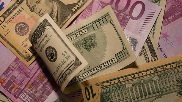 istock Lot of different dollars and euros bills. 538878463