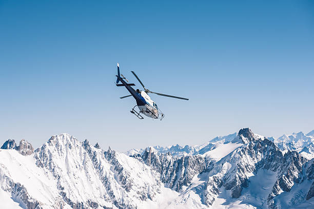 istock Helicopter flying over the Alps 538878653