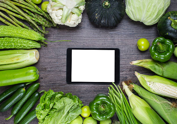 istock different fruits and vegetables on old wooden table 538881576