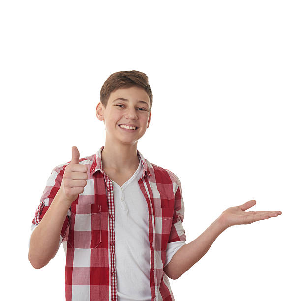 istock Cute teenager boy over white isolated background 538883612