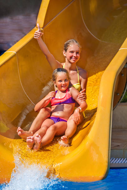 istock Children on water slide at aquapark. 538883942