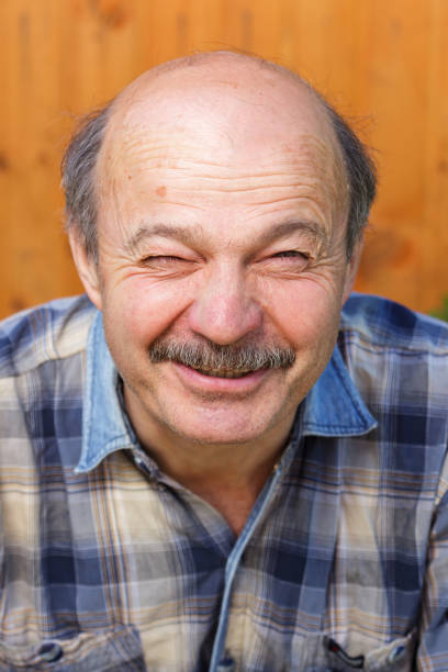 istock Tired elderly man staring. old man sees poorly without glasses. 538885114