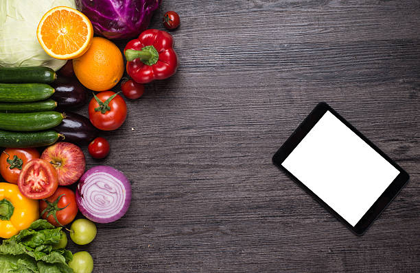 istock different fruits and vegetables on old wooden table 538885438