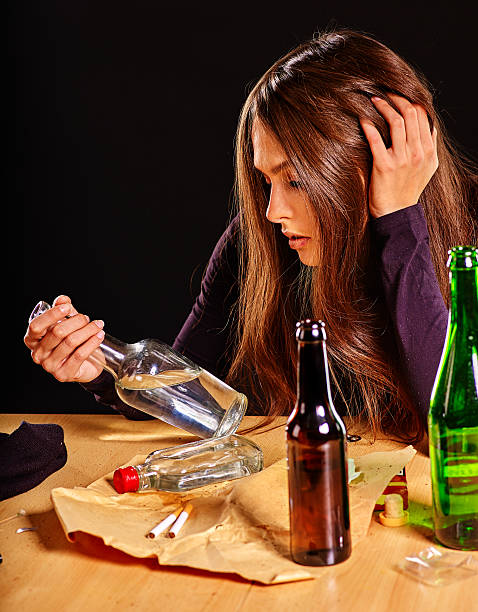istock Girl in depression drinking alcohol. 538886838