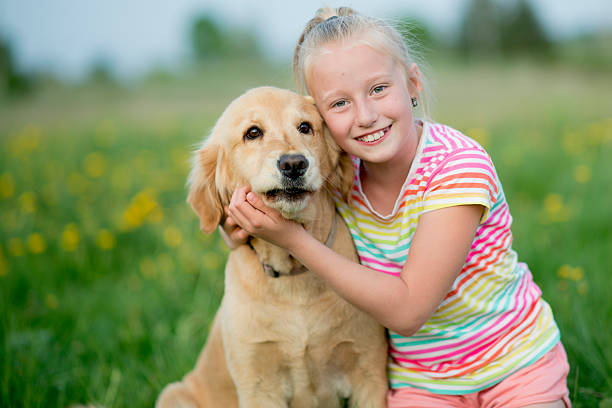 istock Little Girl with Her Dog 538888030