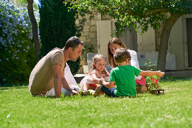 istock Family planting flower 538892516