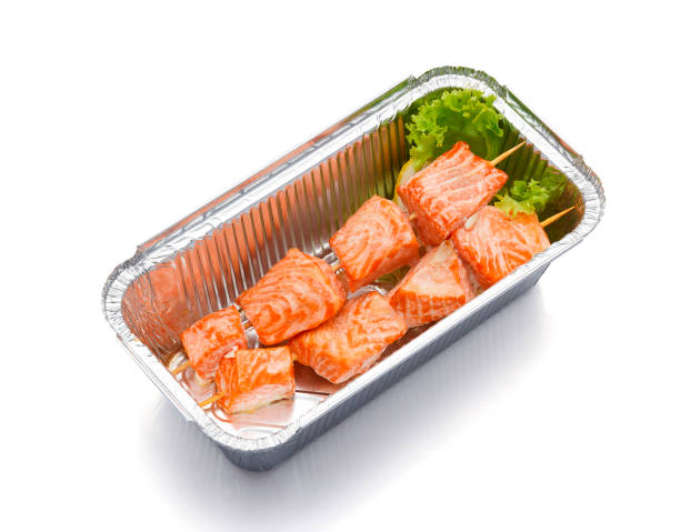 istock Salmon skewers in box isolated on white background 538896094