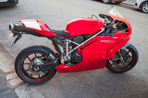 Helsinki, Finland - May 21, 2016: Red super bike Ducati 749, it is a V-twin Desmodromic valve actuated engine sport bike by Ducati Motor Holding between 2003 and 2006. Designed by Pierre Terblanche
