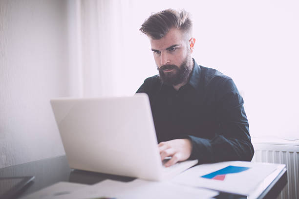 istock Businessman on laptop in office 538899344