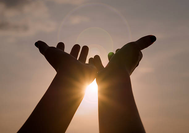 istock Hand on sunset background success, peace,freedom 538899884
