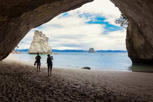 Beautiful and scenic New Zealand. People taking photos at Cathedral Cove