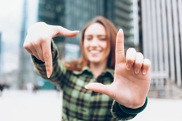 istock Redhead smiling woman making finger frame 538903304