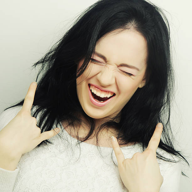 istock Funny woman doing hand sign 538903523