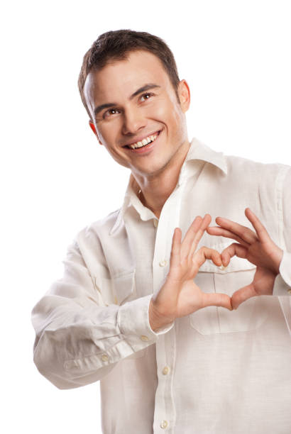 istock Portrait of happy man making heart from his hands 538903886