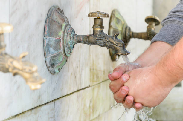istock Wash hands in the street. 538904968