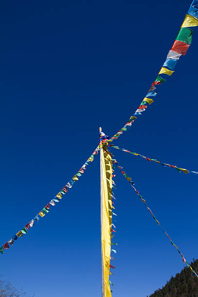 istock colorful prayer flag in tibet under blue sky 538915993