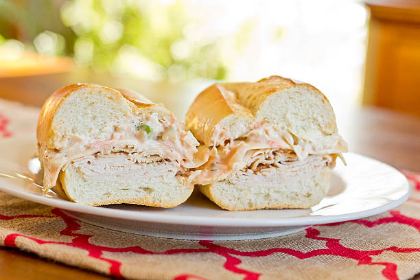 Turkey Reuben Healthy alternative, turkey reuben on a torpedo roll with cole slaw dressing torpedo sandwich stock pictures, royalty-free photos & images