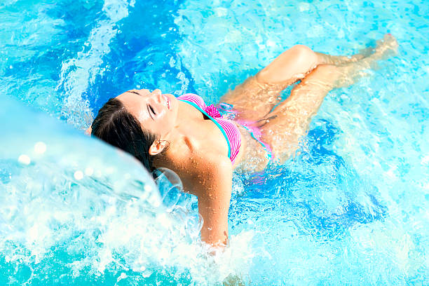 istock Beautiful women in relaxation Pool 538916537