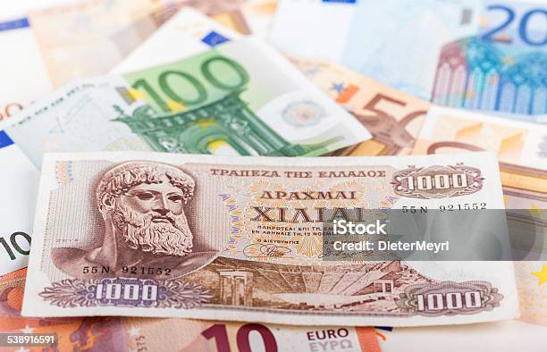 Greek Drachma Lying On Euro Bills Stock Photo - Download Image Now - Greek Drachmas, 2015, Bank Account