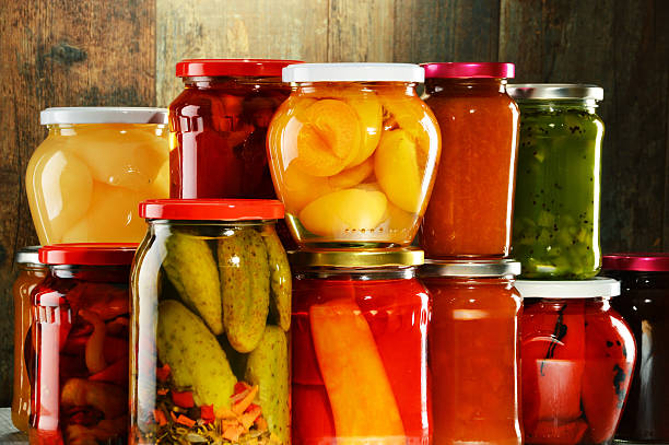istock Jars with pickled vegetables, fruity compotes and jams isolated 538919289