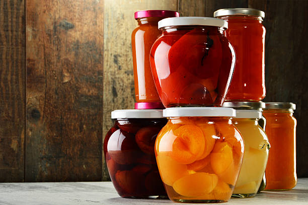 istock Jars with pickled vegetables, fruity compotes and jams isolated 538919337