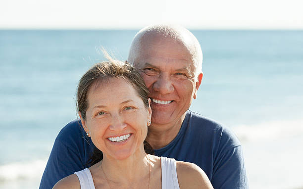 istock Mature couple at sea beach 538927647