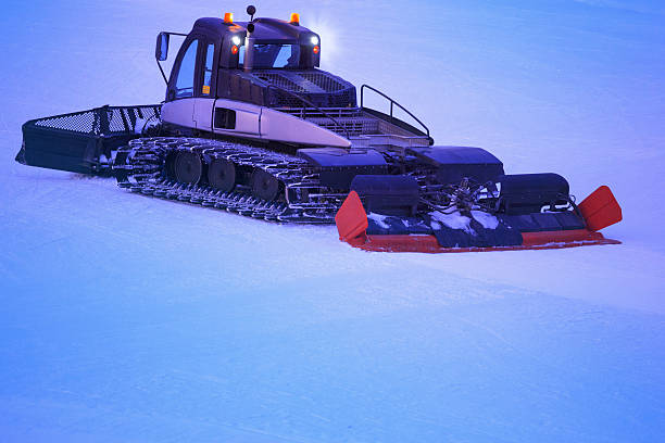 istock Snowcat groomer working  Preparing the ski slopes 538930157