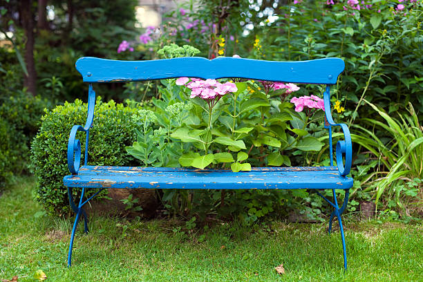 istock Old Blue Bench at the Garden. 538931085