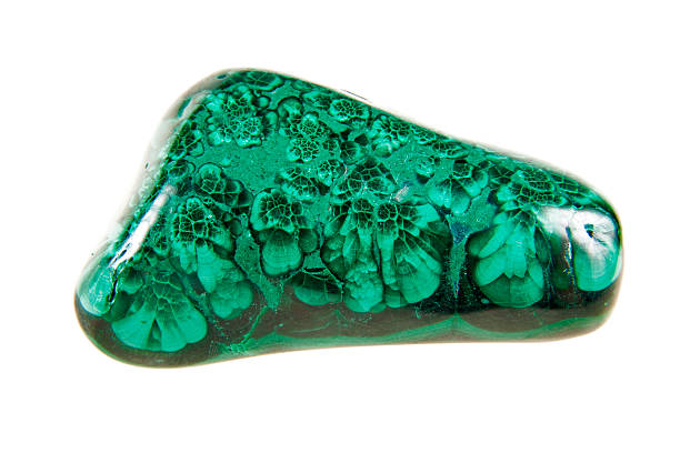 istock Malachite green stone, semi-precious mineral on a white background. 538931275