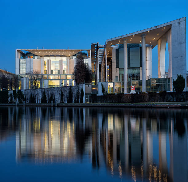 The German Chancellery - Stock Image Berlin, Germany - February 13, 2015: Photo of the German Chancellery building in Berlin at night. The so called \"Bundeskanzleramt\" is the official residence of the german chancellor.  chancellor of germany photos stock pictures, royalty-free photos & images