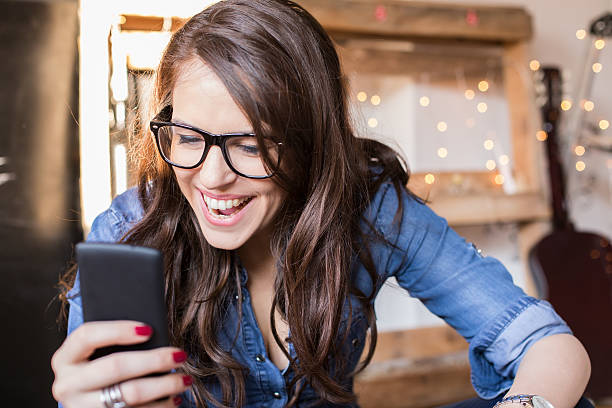 istock Young beautiful hipster woman using smart phone at office 538947741