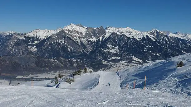 Ski slope and high mountains, view from Pizol.