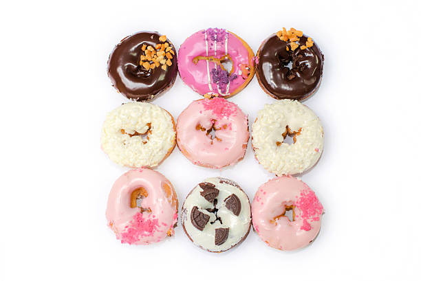 istock Sweet Colorful delicious donuts on white background 538969229