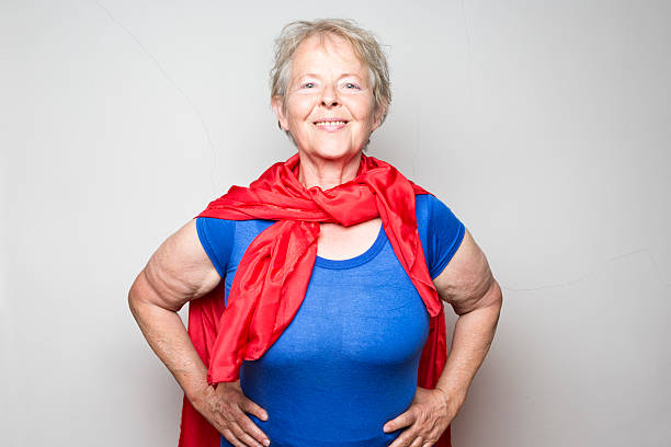 senior woman, 62 years old, dressed as superhero