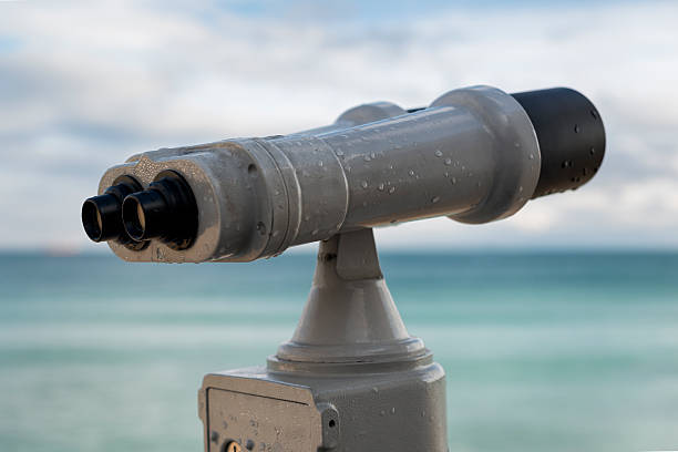 istock sea binoculars by the Black Sea shore. working with coins. 538981691