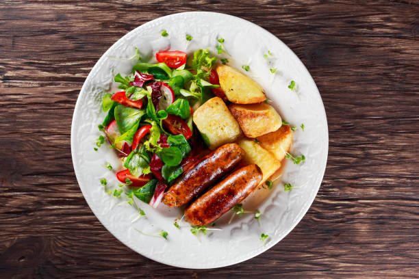 Roasted Sausages with Chips and Mix Vegetable salad.