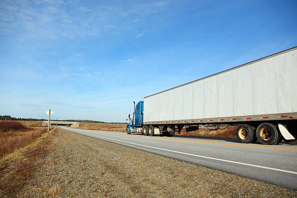 istock Semi-truck on a highway . 538982415