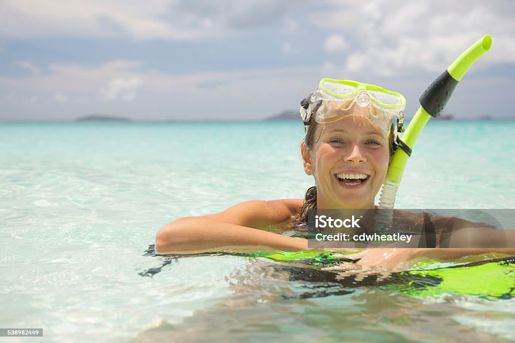 smiling young woman snorkel, mask and fins in the Caribbean Smiling Stock Photo