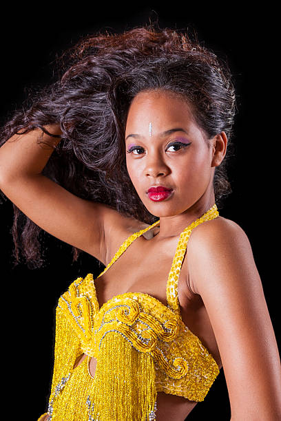 istock Young belly dancer pushing up her hair 538983397