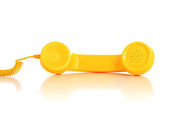 istock Yellow phone isolated over white background 538983689