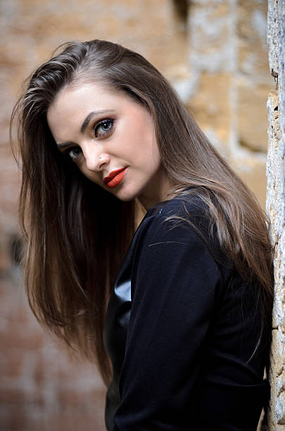 istock portrait of model posing outdoors in black leather clothes 538985850