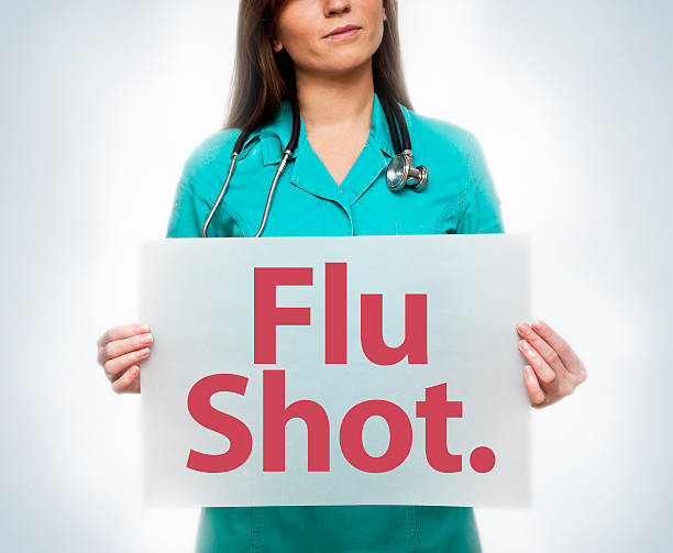 istock Doctor with Flu Shot sign (Click for more) 538988387