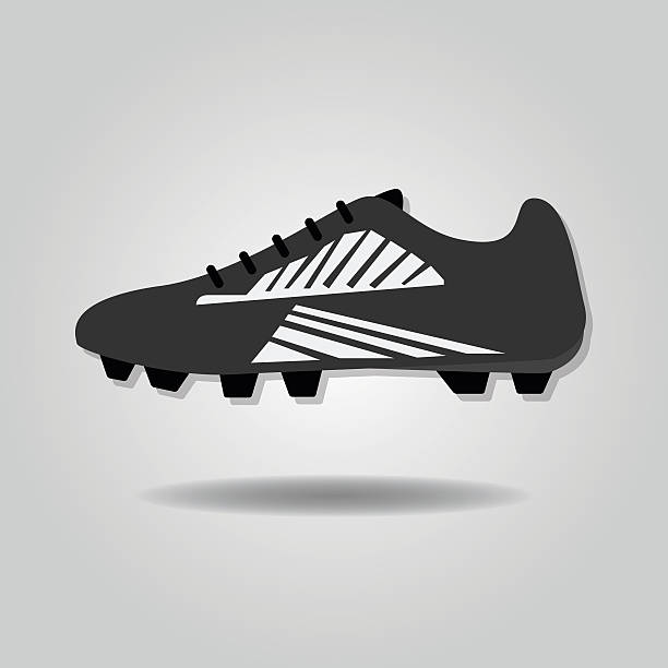 Abstract soccer shoe icon Abstract soccer shoe icon with dropped shadow on gray gradient background cleats stock illustrations
