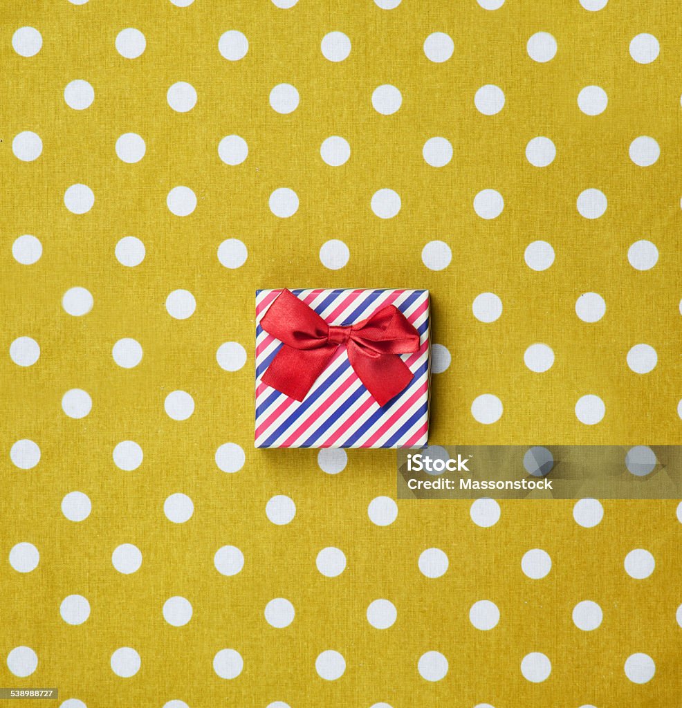 Gift box Gift box on polka dot background. 2015 Stock Photo