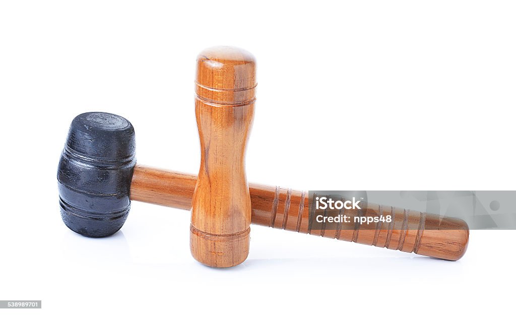 rubber hammer and wooden base for massage on white background 2015 Stock Photo