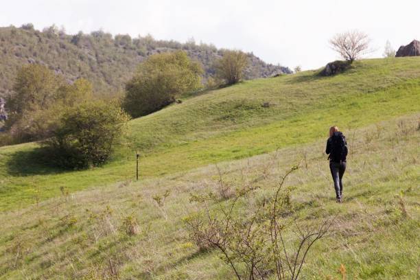 istock young woman hiking 538990006