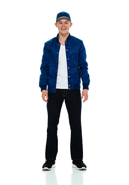 istock Smiling male standing and looking at camera 538990796